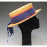 An early 20th century straw boater by Henry Heath Limited, head circumference 56cm.Buyer’s Premium