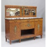 A French Art Deco pollard oak side cabinet with gilt metal mounts, the mirror back above a marble