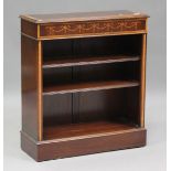 A modern reproduction mahogany open bookcase with satinwood crossbanding and inlaid bellflower