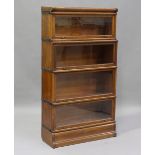 An early 20th century oak Globe Wernicke four-section glazed bookcase, height 156cm, width 87cm,