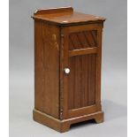 A late 19th century pitch pine bedside cupboard, height 79cm, width 39cm, depth 36cm.Buyer’s Premium