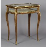A good late 19th century Louis XV style kingwood bijouterie table with applied ormolu mounts, the