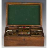 A late 19th century walnut workbox, the interior with a removable tray inset with tortoiseshell