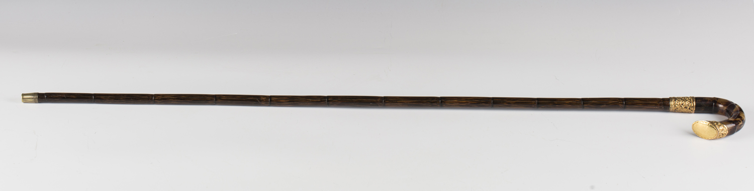 A late 19th century palmwood walking cane, the moulded tortoiseshell handle with gilt metal mount - Image 3 of 7