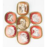 A group of seven 19th century Grand Tour watercolours on ivory portrait miniatures, each depicting a
