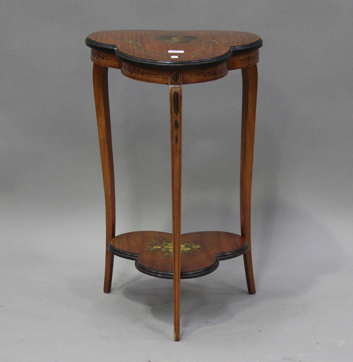 An Edwardian satinwood and painted occasional table, decorated with a portrait of a lady and