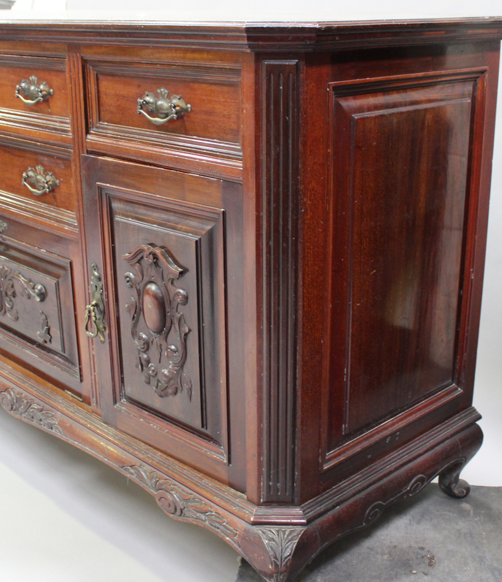 A late Victorian walnut sideboard with carved decoration, fitted with drawers and cupboards, - Image 4 of 4