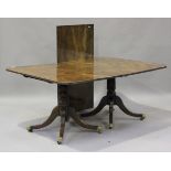 A Regency mahogany twin pedestal dining table with single extra leaf, height 73cm, extended length