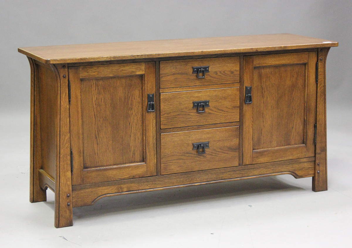 A modern Arts and Crafts style oak sideboard and matching side cabinet by Sherry, sideboard height