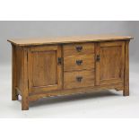 A modern Arts and Crafts style oak sideboard and matching side cabinet by Sherry, sideboard height