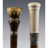 A late 19th century walking cane, the ivory and brown resin handle detailed 'Jose Torres Alarcon',