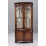 A modern reproduction mahogany bowfront corner display cabinet by Bevan Funnell, height 189cm, width