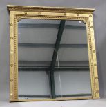 A large late Victorian giltwood and gesso overmantel mirror with moulded leaf pediment and rosette