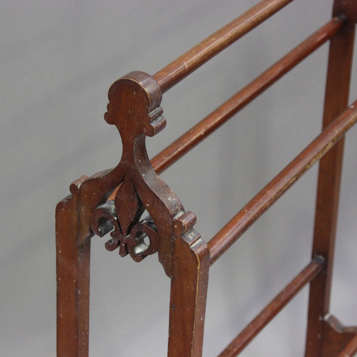 A late Victorian mahogany towel rail, each end fret cut with a fleur-de-lis, height 96cm, width - Image 3 of 3