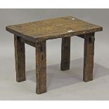 A late 19th/early 20th century provincial oak rustic occasional table, height 43cm, width 61cm,