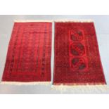 A small Afghan rug, late 20th century, 160cm x 102cm, together with another similar Afghan rug,