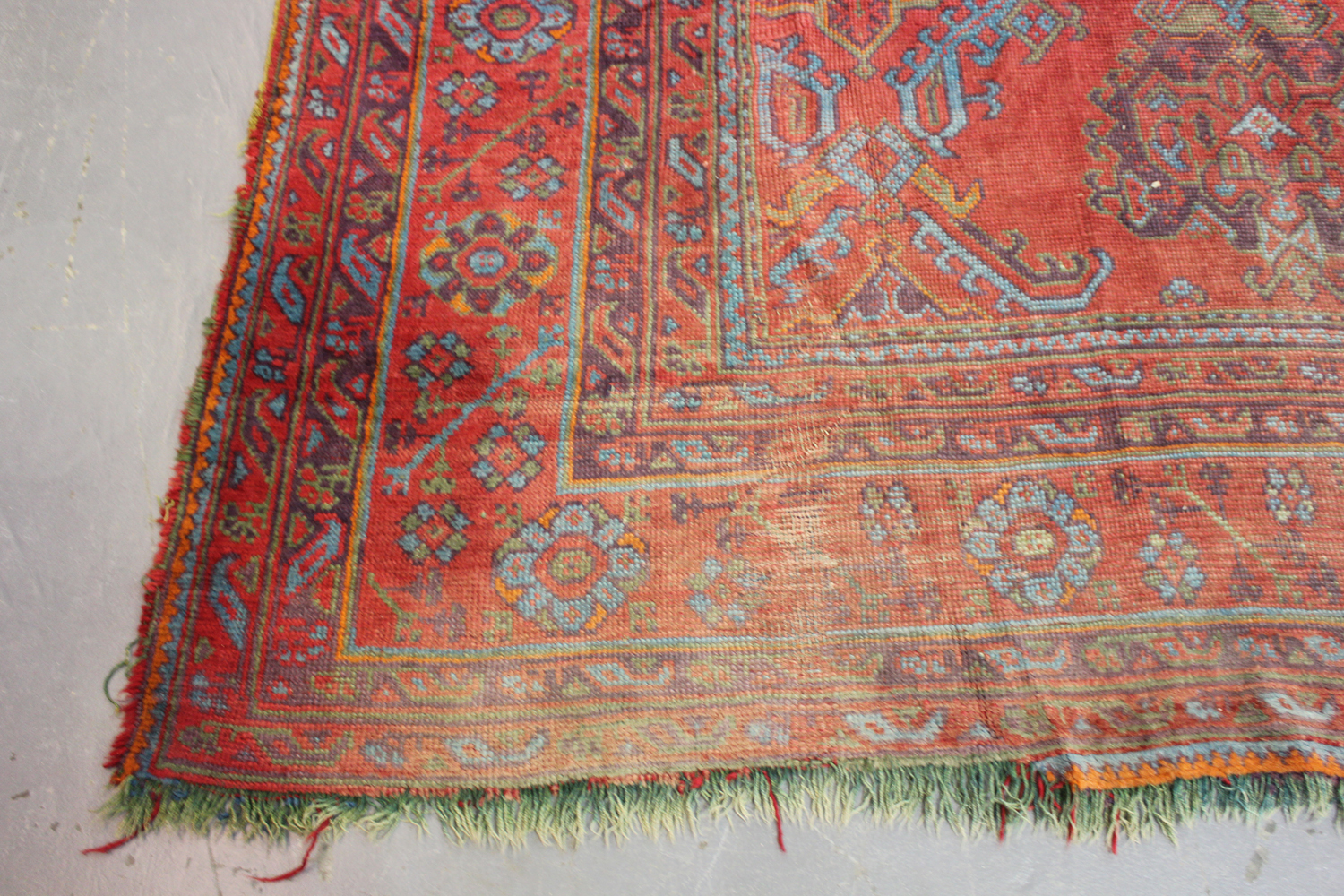 A large Turkish 'Old Turkey' carpet, early 20th century, the red field with overall palmettes and - Image 4 of 11