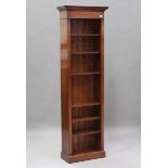 A modern reproduction mahogany narrow open bookcase, made by George Read, height 202cm, width