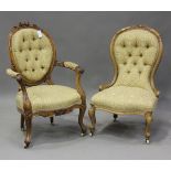 A mid-Victorian walnut showframe gentleman's salon armchair with carved foliate crest, height 100cm,