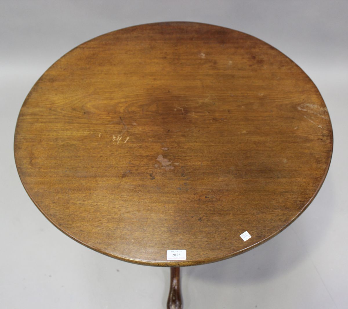 A late George III mahogany tip-top wine table, on tripod cabriole legs, height 72cm, diameter 83cm. - Image 3 of 4