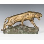 Thomas Cartier - an early 20th century French gilt and green patinated cast bronze model of a