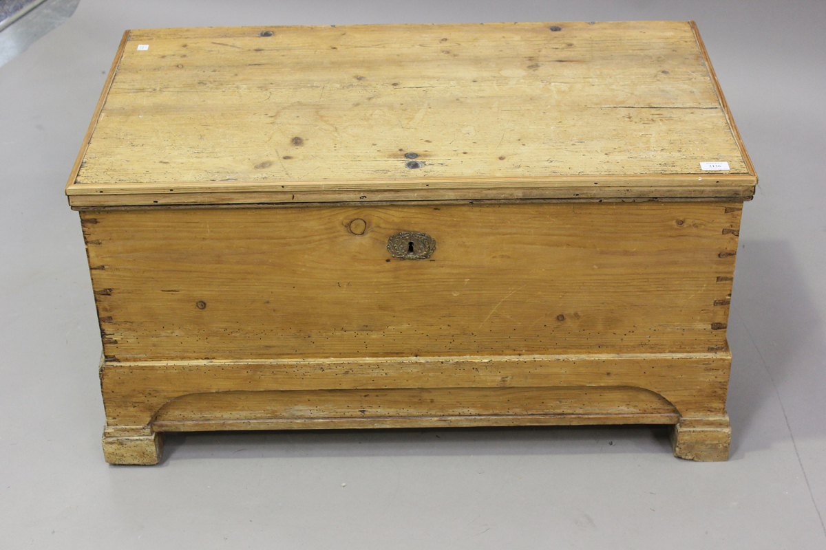 A late 19th century pine trunk, the hinged lid revealing a candlebox, height 50cm, width 96cm, depth - Image 3 of 3