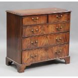 A George III mahogany chest of drawers with original brass handles, height 89cm, width 95cm, depth