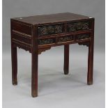 A 19th century Chinese softwood side table, fitted with two carved and painted drawers, height 87cm,