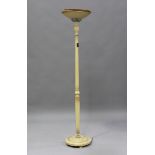 An Art Deco cream painted lamp standard by Berry's, with metal uplighter above a stepped glass