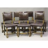 An early/mid-20th century harlequin set of seven oak framed dining chairs, comprising a set of