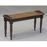 An Edwardian oak window seat, in the manner of James Shoolbred, height 51cm, width 91cm, depth