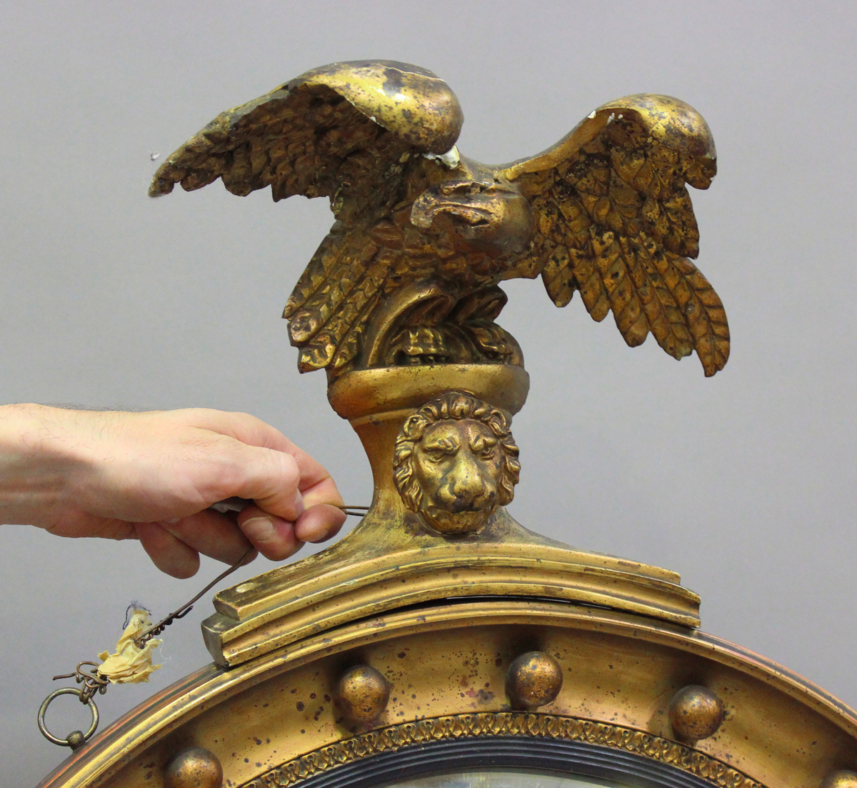 A 20th century Regency style gilt painted circular convex wall mirror with eagle surmount, height - Image 5 of 5