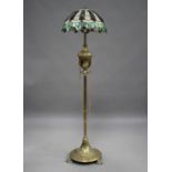 An Edwardian brass telescopic lamp standard, later converted to electricity and fitted with a