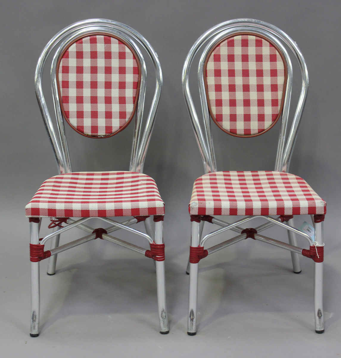 A set of ten French aluminium framed café chairs, height 88cm, width 42cm.Buyer’s Premium 29.4% (
