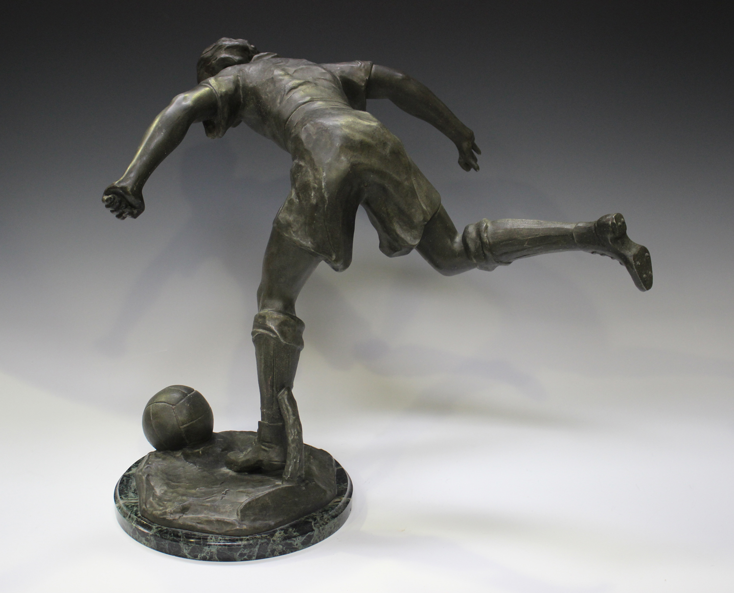 Lemoyne - a French patinated spelter figure of a footballer about to strike a ball, the base bearing - Image 4 of 6