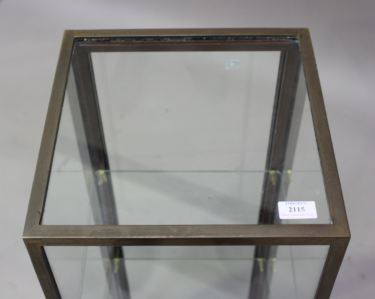 A mid-20th century brass framed display case with lockable hinged door, two glass shelves and - Image 3 of 4