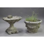 A late 20th century cast composition stone bird bath of scallop shell form, height 43cm, width 54cm,