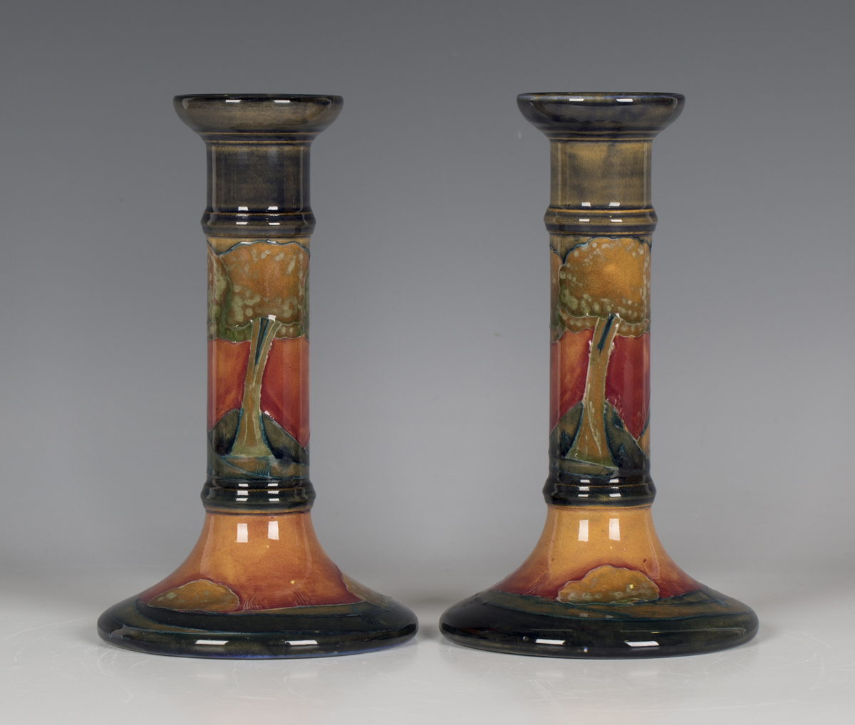 A pair of Moorcroft Eventide pattern candlesticks, circa 1925, each of cylindrical form, impressed - Image 7 of 7