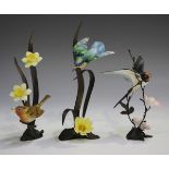 Three Royal Worcester British bird sculptures, each on a bronze base, comprising robin, kingfisher