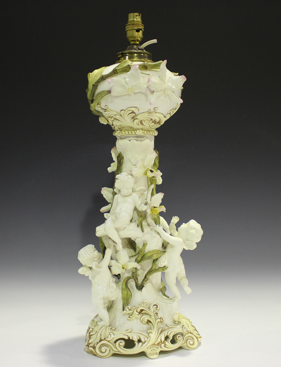 A Moore Brothers oil lamp, late 19th century, the trunk stem applied with four putti and entwined - Image 16 of 17
