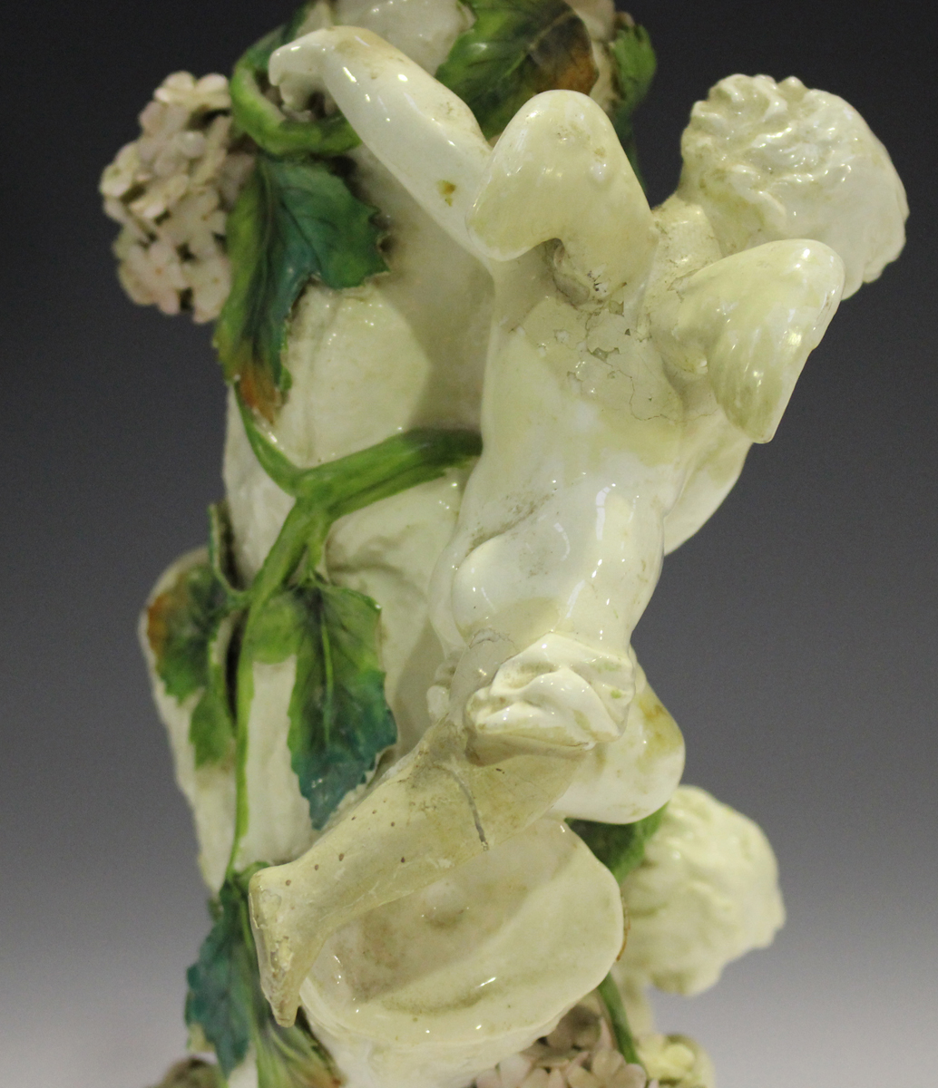 A Moore Brothers oil lamp, late 19th century, the trunk stem applied with four putti and entwined - Image 5 of 17