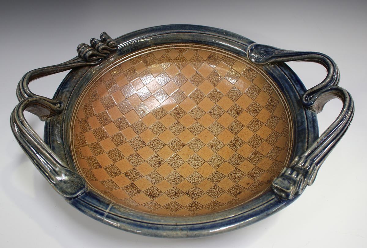 A David Osborne studio pottery two-handled circular bowl, the interior decorated with a checkerboard