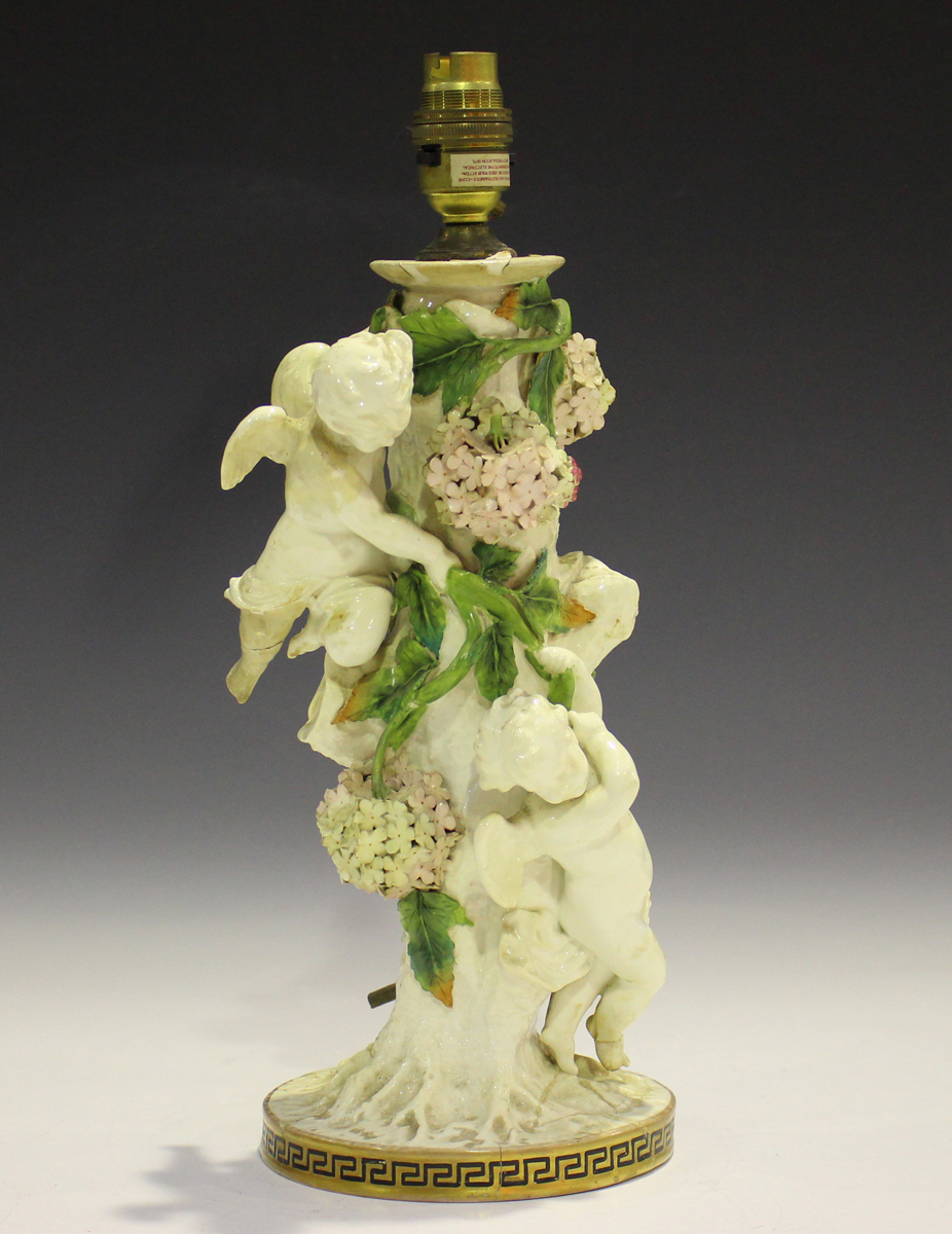 A Moore Brothers oil lamp, late 19th century, the trunk stem applied with four putti and entwined - Image 9 of 17