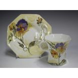 A Rozenburg den Haag eggshell porcelain coffee cup and saucer, circa 1908, painted with flowers,