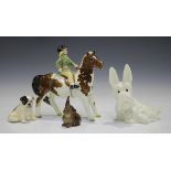 A Beswick skewbald Girl on Pony, model No. 1499 (one leg glued), together with two Beswick animals