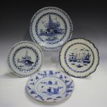 A Lambeth Delft plate, circa 1760, blue painted with a chinoiserie landscape, diameter 18.5cm,