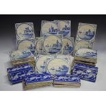 A group of approximately fifty Dutch Delft blue and white tiles, late 19th/early 20th century,