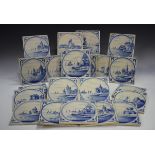 A group of approximately sixty Dutch Delft blue and white tiles, late 19th/early 20th century,