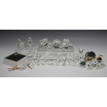 A group of mostly Swarovski Crystal ornaments, including a six-piece train set, two owls, an