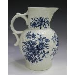 A large Worcester blue painted jug, circa 1770-85, decorated with the Pine Cone Group pattern over a